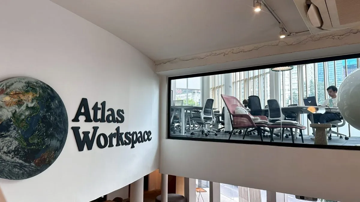 Atlas Workspace signage beside the mezzanine window